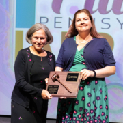 The outgoing President Ruth Petran (left) handed over the gavel to the incoming President, Michelle Danyluk.